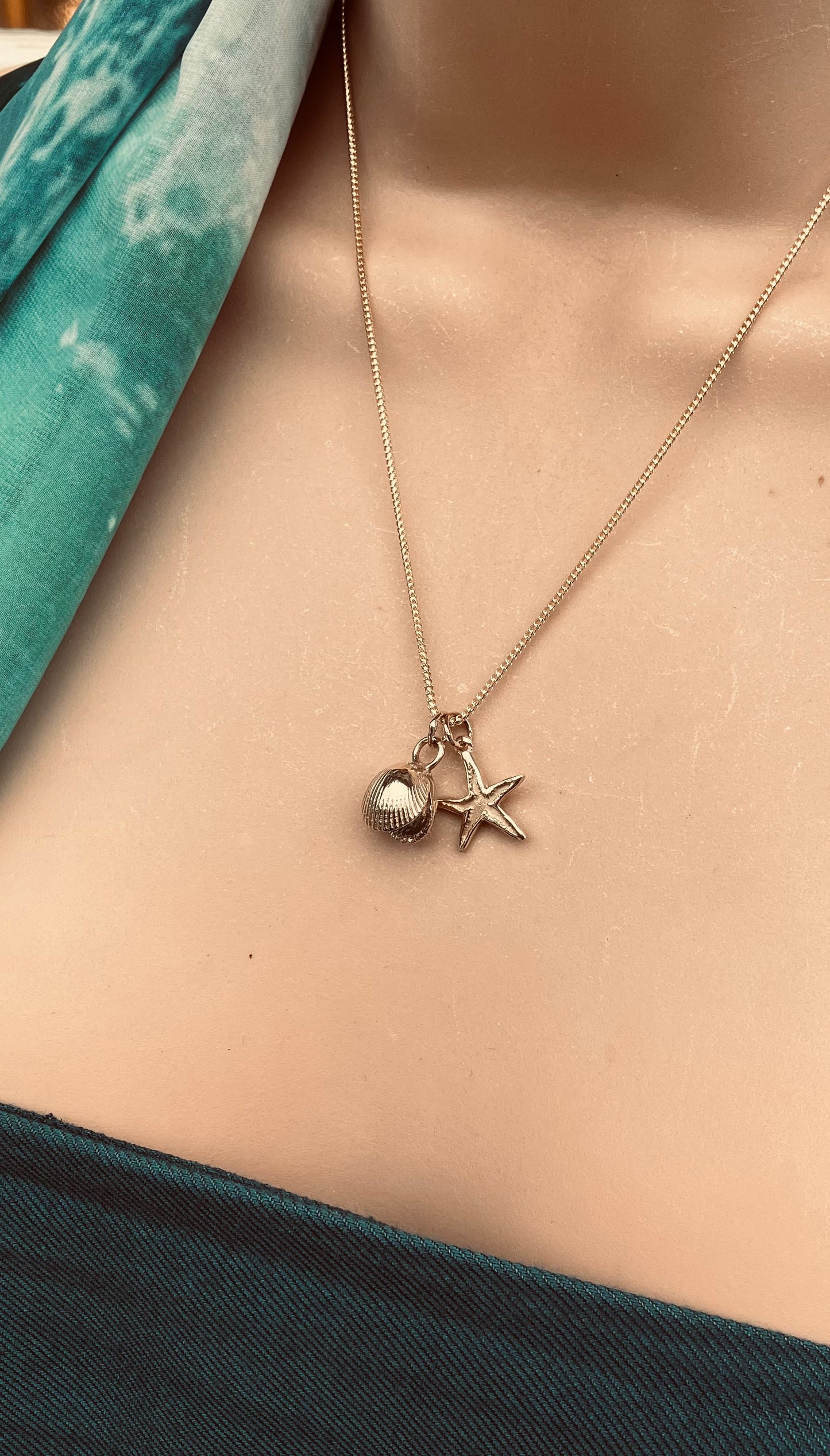 Gold starfish and cockle shell necklace