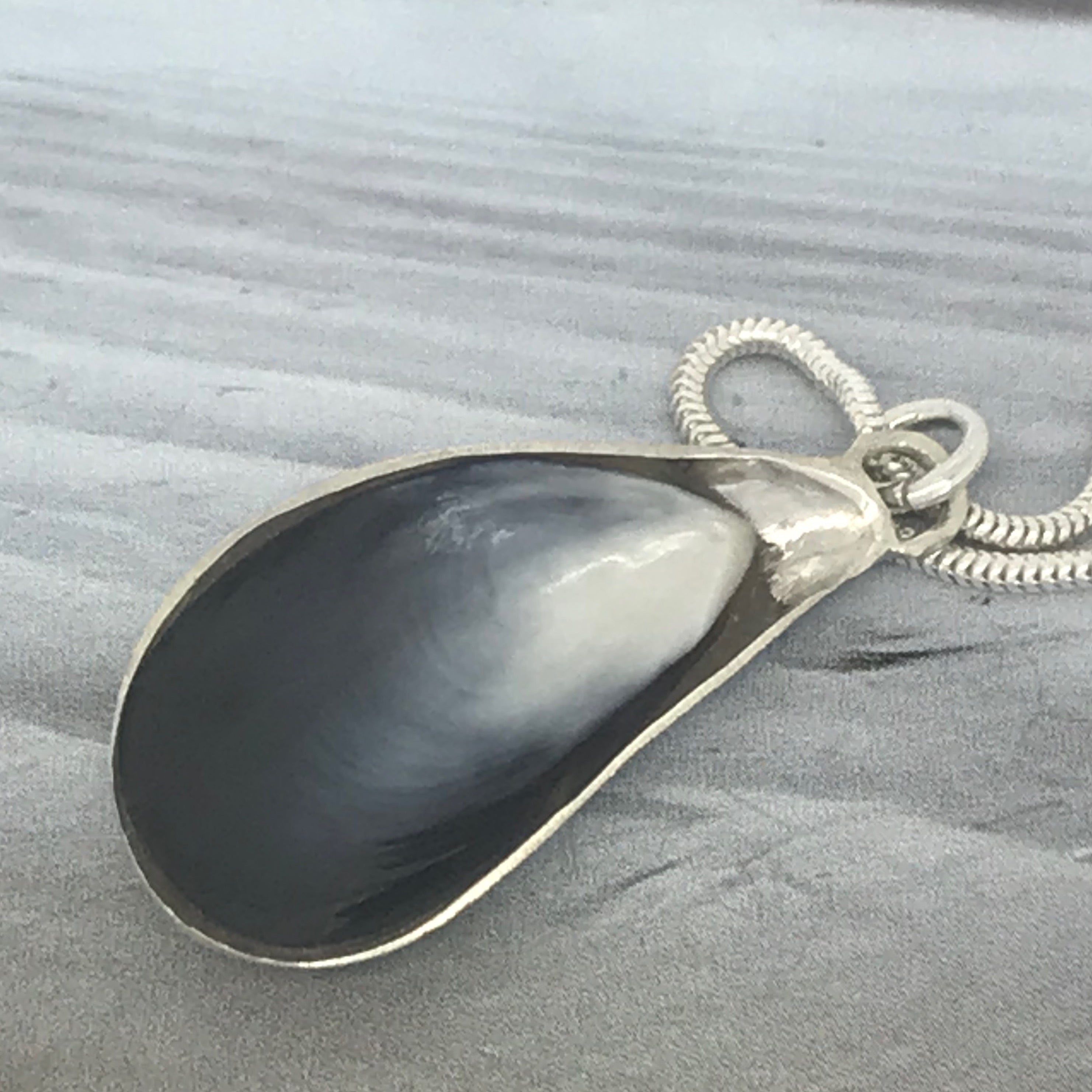 Silver mussel shell on sale necklace